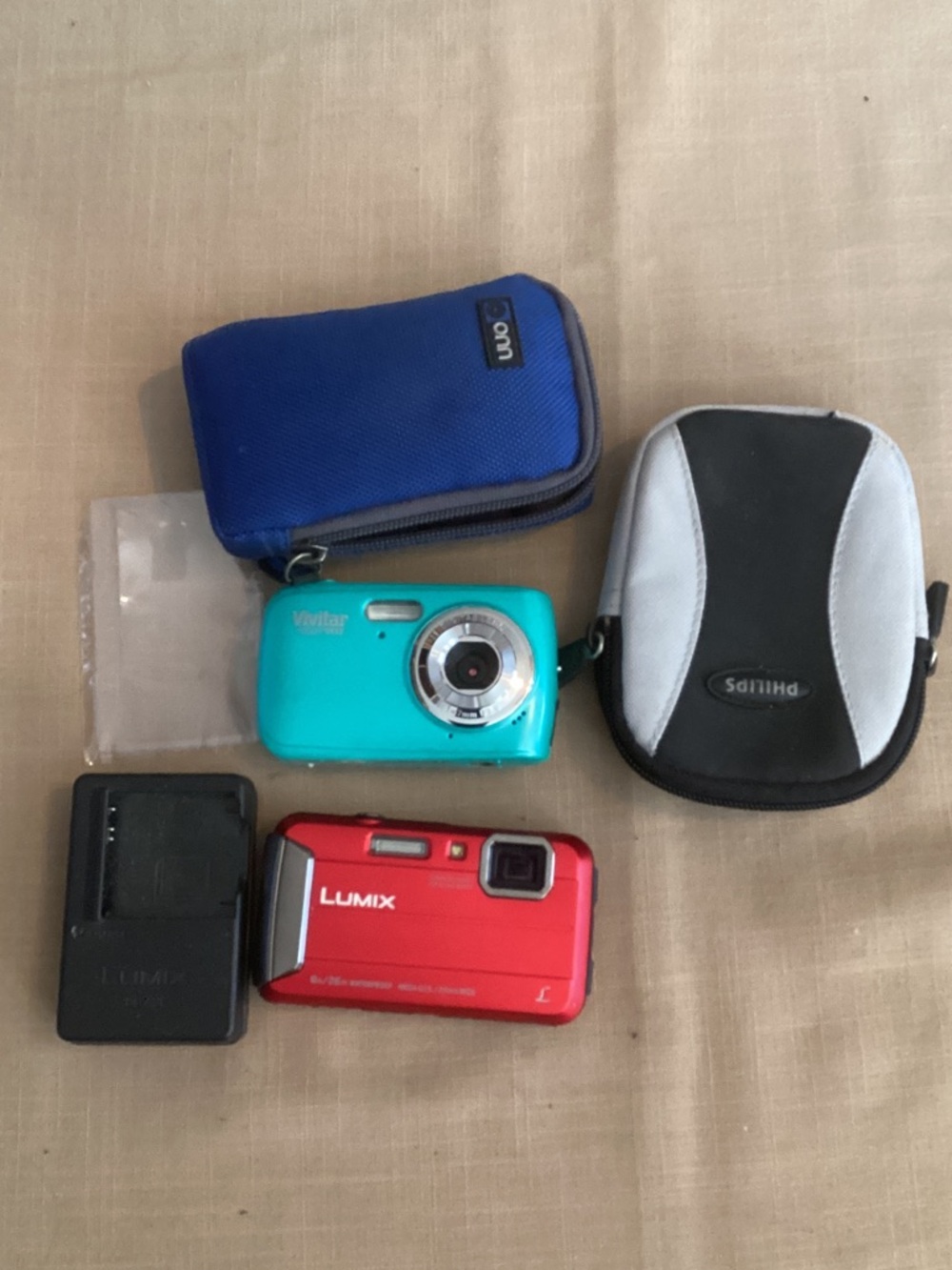 LUMIX digital camera w/ charger and VIVITAR digital cameras